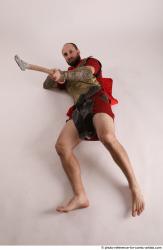 MARCUS LAYING POSE WITH SPEAR